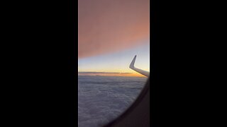 Heavenly Horizon: Sunset Symphony Above the Clouds