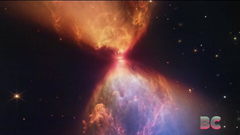 Cosmic hourglass captured by the James Webb Space Telescope reveals birth of a star