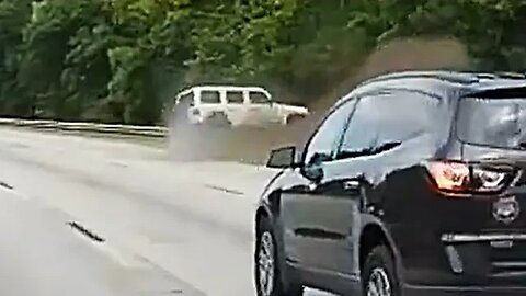 White Jeep was having trouble maintaining the lane!