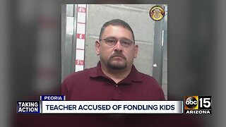 Peoria teacher arrested, accused of molesting three children