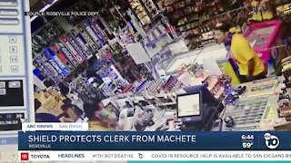 Plexiglass shield protects clerk from machete