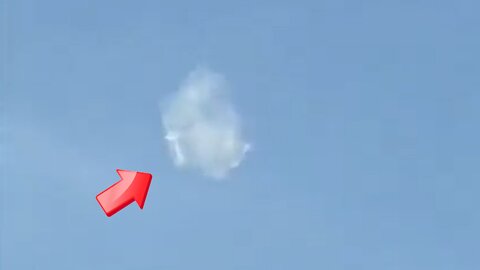 Small UFO mimicking a cloudy sky over a residential area [Space]