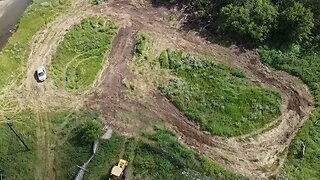 driving around the track with a drone shot