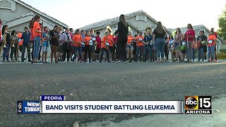 Valley high school band visits student battling leukemia