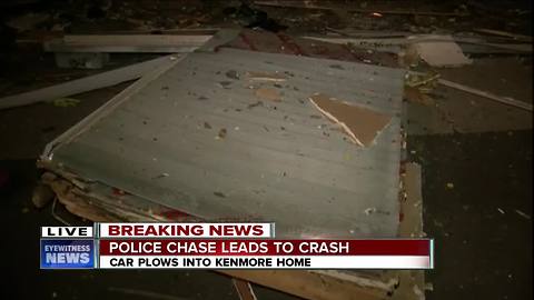 Truck crashes through house in Kenmore