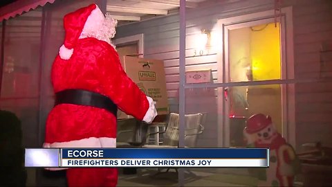 Ecorse firefighters bring Christmas spirit to those in need by delivering dozens of presents to local families