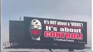 Anti mask billboards taken down after community complaints