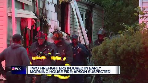 Two firefighters injured fighting house fire