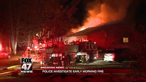 Lansing Police rescue students trapped in massive house fire, firefighter injured