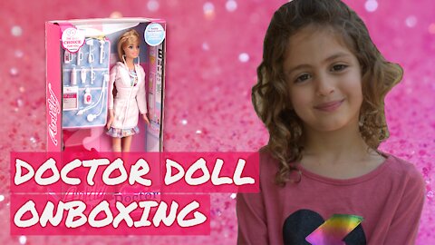 Noya opens a doctor Barbie doll