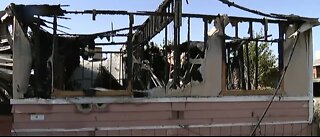 Mobile home burns after earthquake