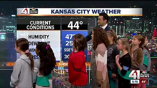 Girl Scouts help do the wx