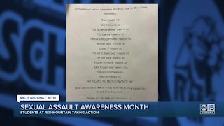 Red Mountain High School students post anti-sexual harassment flyers on campus