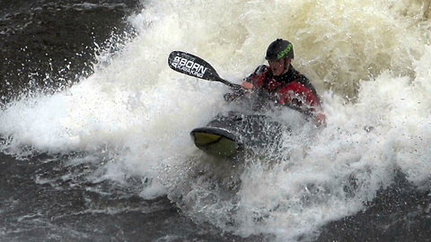 Freestyle Kayaker Takes On Crashing Waters
