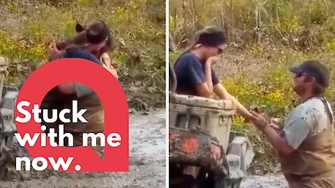 Man proposes to his girlfriend while she is stuck in MUD