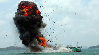 Sinking Ships: Indonesia Battles Illegal Fishing By Blowing Up Impounded Boats