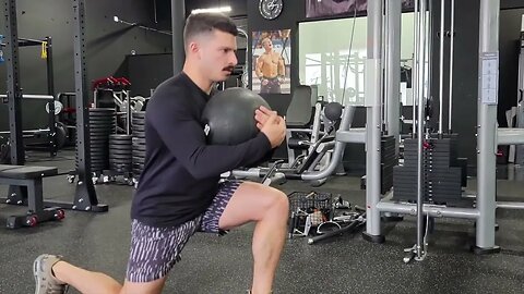 Med Ball Front Carry Alternating Reverse Lunges