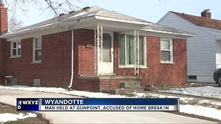 Man held at gunpoint,, accused of home break-in