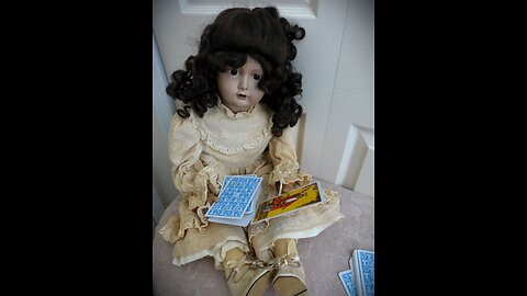 Haunted Lizza the Doll, odd lizard skin doll who talks through Tarot cards!