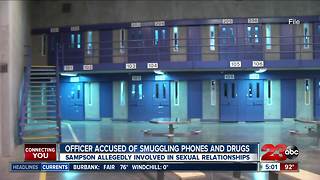 Officer accused of smuggling phones and drugs