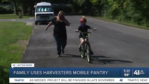 Family uses Harvesters mobile pantry