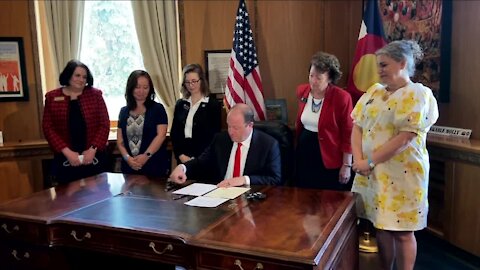 Gov. Polis signs bill to better protect kids from domestic abuse after murder of 10-year-old Ty Tesoriero