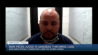 Man faces judge in sandbag throwing case