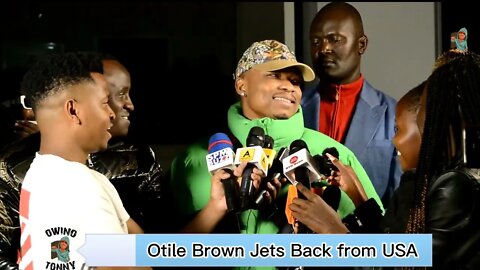 Otile Brown shades tears at JKIA as he is gifted a portrait of his grandmother