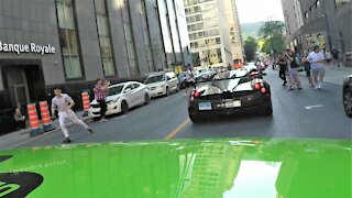 Crowd goes crazy as exotic car club arrives in the streets of Montreal