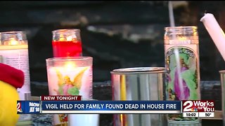Vigil held for family found dead in house fire