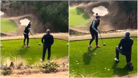 Adorable marriage proposal on a golf course