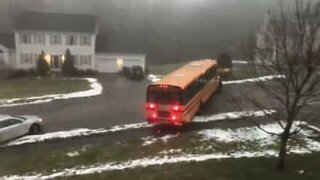 School bus dangerously looses control on icy road