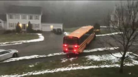 School bus dangerously looses control on icy road