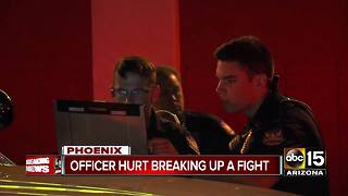 Phoenix officer hurt trying to break up a fight