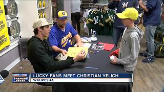 Yelich signs autographs day after Brewers clinch spot in playoffs