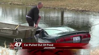 Car pulled from pond Monday morning