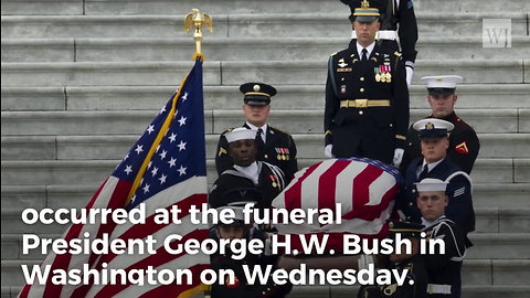 George W Bush Offers Lighthearted Gesture to Michelle Obama at His Father’s Funeral