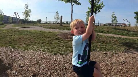 Luke on the zipline at Summit Park - August '22