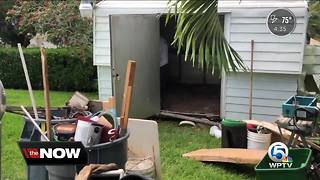 Cleaning up debris from yard in preparation to hurricane season