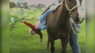 "Young boy Learns How to Ride a Horse"