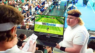 Playing Wii Tennis at the Tennis!