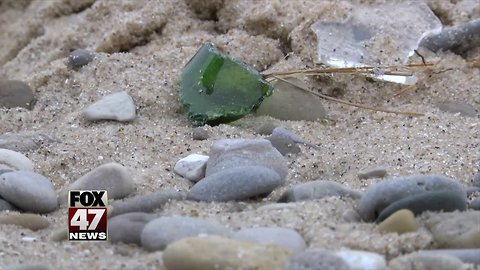 Broken glass deliberately spread on beach at Sleeping Bear Dunes