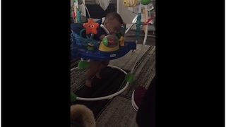 Exhausted baby can't decide between sleeping or playing