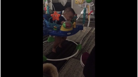 Exhausted baby can't decide between sleeping or playing