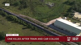 1 killed, another person transported to hospital after train-car crash