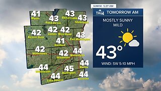 Mostly sunny and breezy Thursday