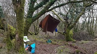 Slacking off ridgeline to remove the tarp. Reddacleave campsite. Dartmoor 26th March 2023