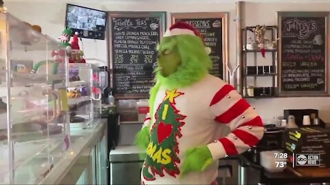 Grinch serves up onion lattes and green, furry cheesecake at cafe in Safety Harbor