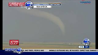 Funnel cloud forms east of DIA