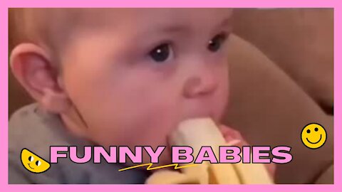 Cute baby Eating Banana